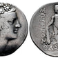 front and back Ancient coin with a Dionysus on one side and text  and heracles on the other, set against a white background.